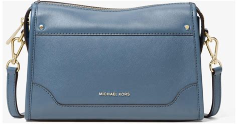 michael kors harrison flight bag|Michael Kors large suitcase.